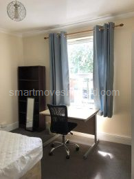 First floor double bedroom overlooking front garden